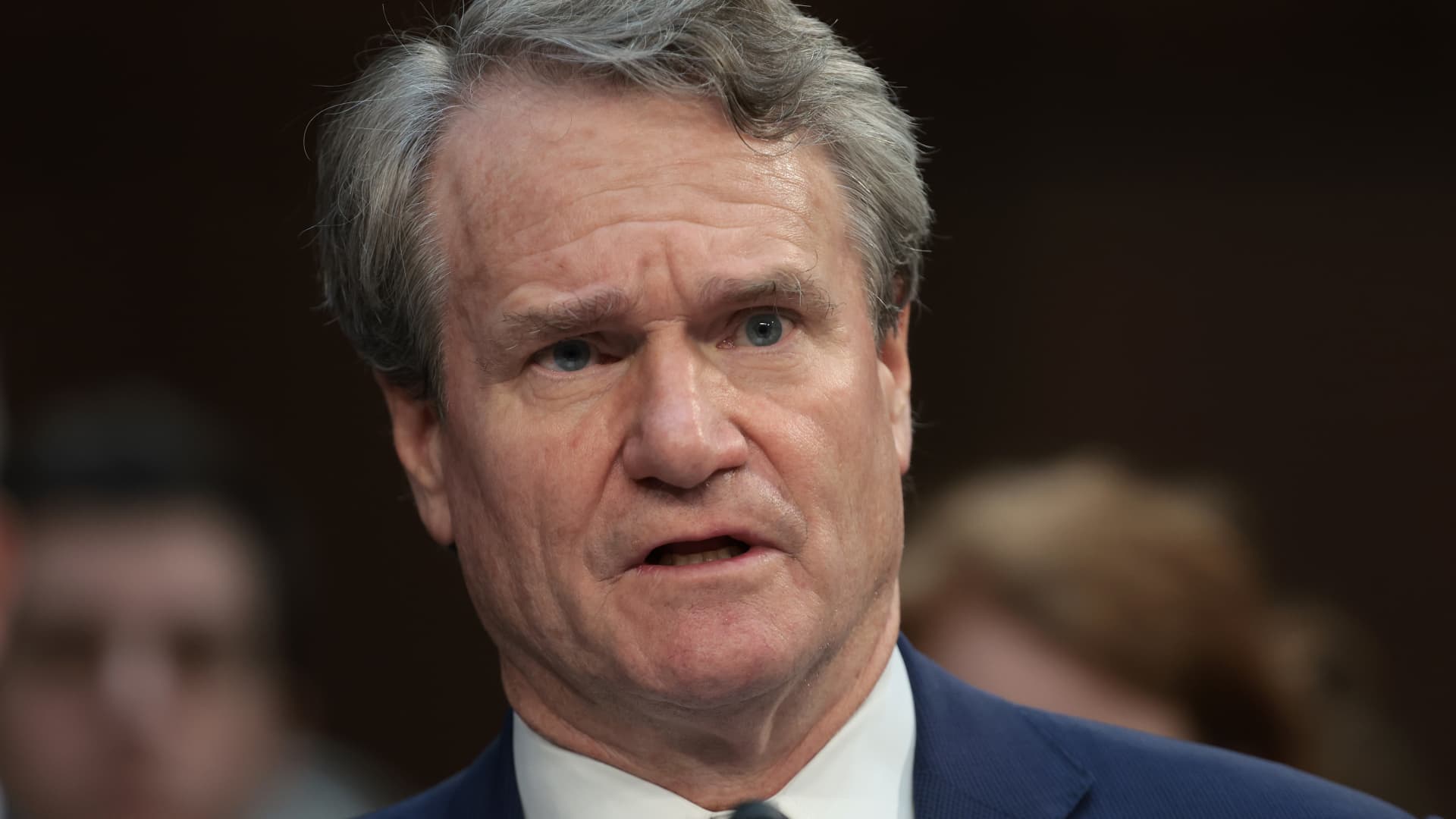 Bank of America expects third-quarter investment banking fees to fall more than 10%; shares slide